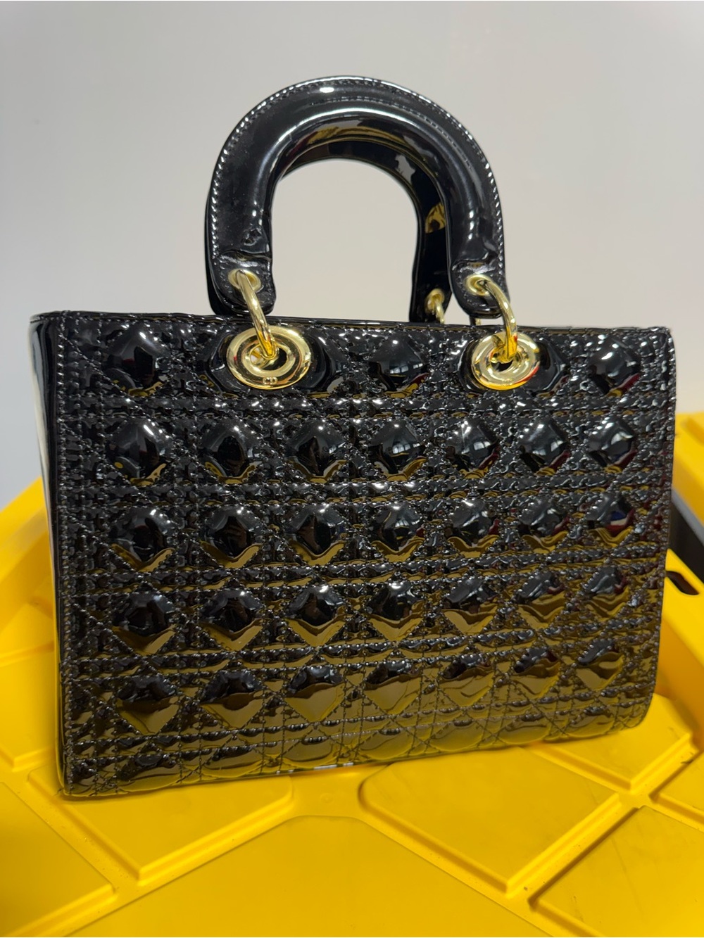 Black Patent Quilted Top-Handle Bag with Gold Hardware
